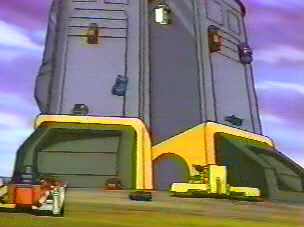 Giant Decepticon Warrior is swarmed. I think you can see Fixit climbing up his leg. Bringing up the rear: Overload (L) and Erector (R).